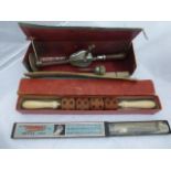 A Punkt-Roller fat reducer in original box, a boxed Timor ladies hair waving iron and a Veedee/