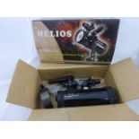 A boxed Helios Starbox 76mm f/600 tabletop Catadioptric telescope.