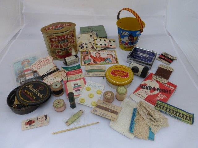 A small selection of sewing related items, a tinplate child's bucket and three tins etc.