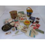 A small selection of sewing related items, a tinplate child's bucket and three tins etc.