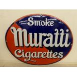 An unusual Muratti Cigarettes oval enamel sign by Bruton of Palmer's Green, with two areas of