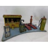 A good Marx tinplate forecourt model of a 'Roadside Rest Service Station'.