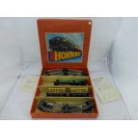 A boxed Hornby O gauge clockwork M1 passenger set.