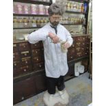 An unusual figure of a pharmacist, as positioned in the pharmacy at Yesterday's World, probably of