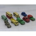 A group of nine playworn Dinky Toys including buses.