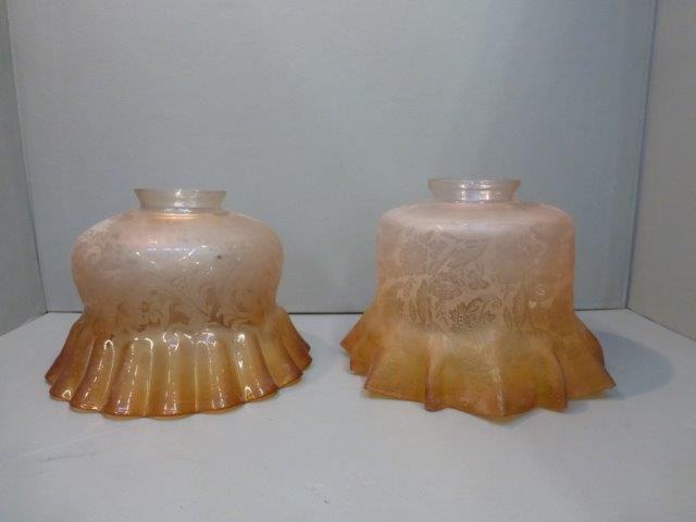 Two Edwardian amber tinted flared glass lamp shades.