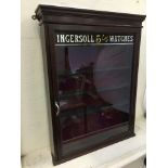 An Ingersoll Watches front opening dispensing cabinet, 24 1/2 x 31 1/2".
