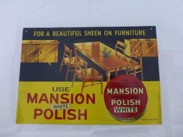 A Mansion White Polish pictorial tin advertising sign by Atlantis (East) Limited, 13 3/4 x 9 1/2".