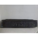 An early bronze shop sign - 'Provisions', 34 x 8 1/2".