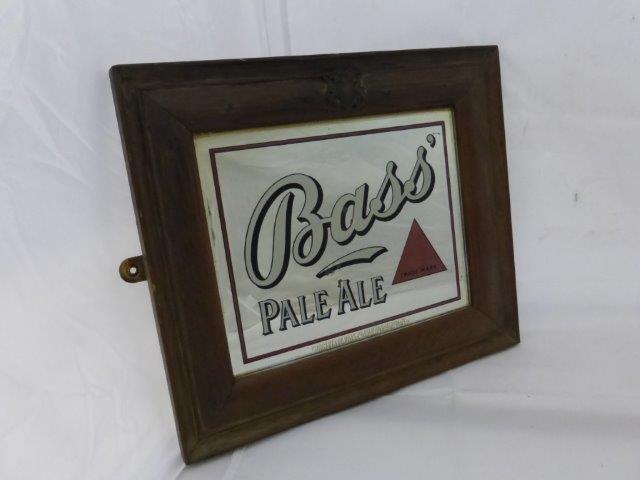 A small Bass Pale Ale advertising mirror, in original frame stamped Bass with applied crest, 13 1/