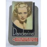 An Art Deco pictorial showcard promoting Danderine - 'gives instant beauty and lustre to your