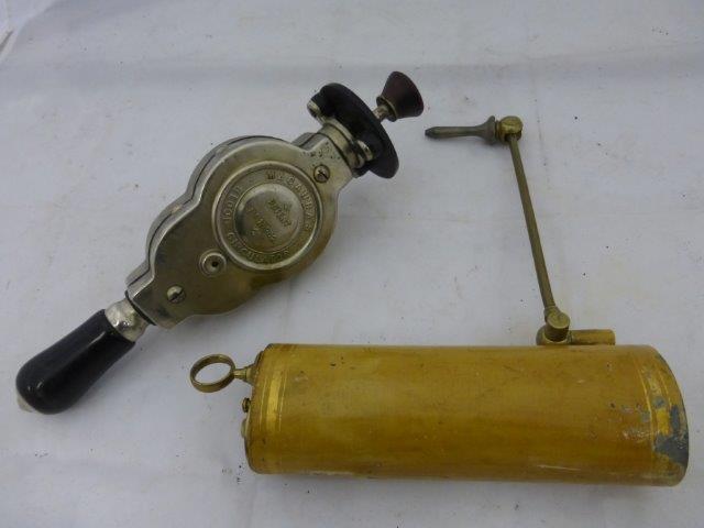 Yesterday's World Pharmacy - a Macaura Blood Circulator and an early part brass ear syringe.