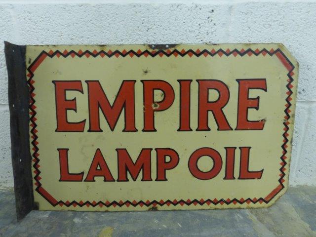 An Empire Lamp Oil double sided enamel sign with hanging flange, in good condition, 24 x 15".