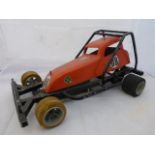 A part made Koni petrol racing dune buggy, no engine.