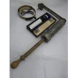 A cased Keeler of Wigmore St. W1 ophthalmoscope with original instructions plus two further