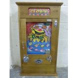 A reproduction 'Clown' Allwin style slot machine.