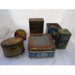 A quantity of assorted tins.