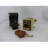 Yesterday's World Camera Shop - a Kodak Pocket Automatic camera, a Kodak Brownie Flash B and a