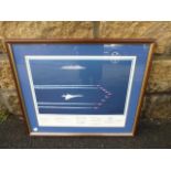 A framed and glazed photograph of the QE2, Concorde and the Red Arrows, in perfect formation, with