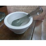 A mortar with glass pestle.