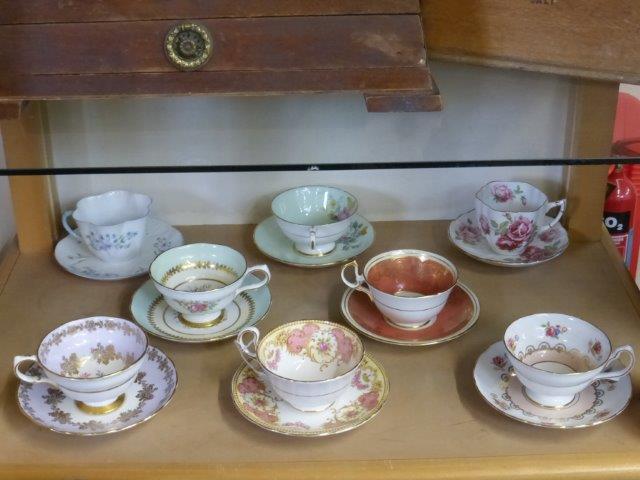 Eight collectors' cabinet cups and saucers with makers including Paragon, Aynsley etc.