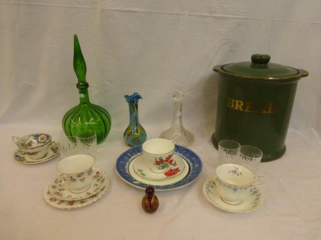 A cut glass decanter and four tumblers, a selection of Royal Albert collectors' cups and saucers,