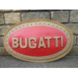 An oval Bugatti fibreglass sign, 37 x 23".