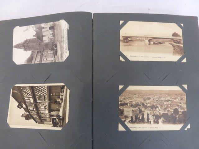 An album of early French postcards mostly black and white, some depicting transport. - Image 3 of 3