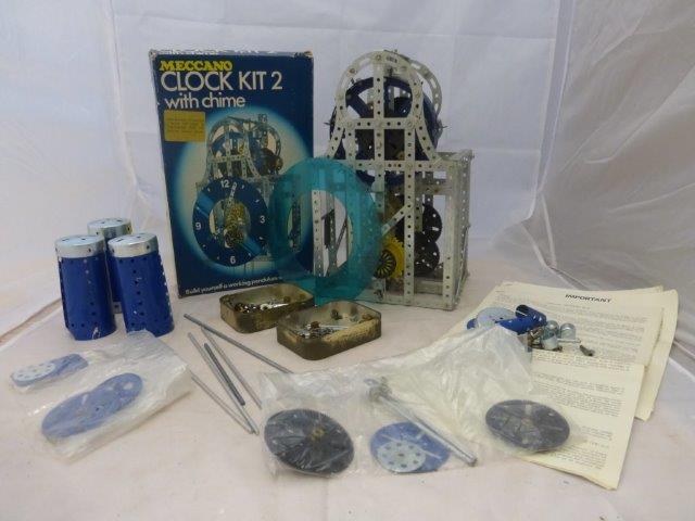 A Meccano Clock Kit 2 with chimes, original box and instructions, partially made.