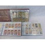 Three albums of assorted Ardath, Players and Wills cigarette cards including sport celebrities.