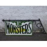 A Monsters Lemonade pictorial double sided enamel sign on metal hanging bracket, with creasing and