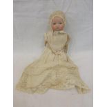 An Armand Marseille bisque headed baby doll stamped A.M. 311/2.