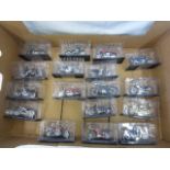 Fourteen boxed miniature motorbikes, various ages and models.