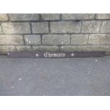 A painted metal shop sign marked Chemist, 54 3/4 x 3 1/2".