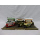 A set of six Corgi British electric train collection and display stand comprising London