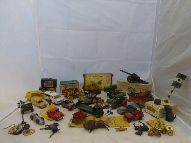 A collection of die-cast and other models including play worn Dinkys, some with partial boxes, a