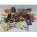 A box of Yesteryear spares, including original boxes, wheels, 1980s Matchbox catalogues, etc.
