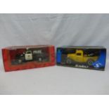 A boxed Mira E/1:18 Chevy Panel Truck 1950 and a boxed Solido Ford Depanneuse.