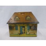 A William Crawford & Sons Lucy Attwell 'kiddibics' biscuit tin money box in the form of a cottage.