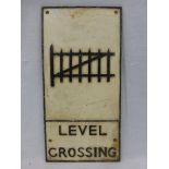 A cast metal level crossing railway plaque, possibly reproduction, 11 x 23".