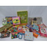 A box of assorted board games, including Pegity, Halma, etc.