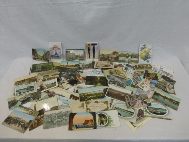 A collection of assorted postcards including Edwardian, humorous, Donald McGill, pictorial, seaside,