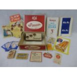 A Bournville Chocolate display box containing assorted chocolate related advertising including a