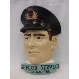 A plaster Senior Service Cigarettes advertising wall plaque, with small areas of restoration.