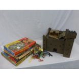 A wooden play fort and boxed jigsaws, etc.