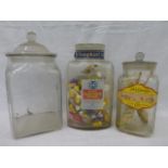 Three assorted glass confectionery jars.