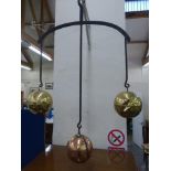 Yesterday's World Museum Pawn Brokers - a pawn broker's shop sign in the form of three hanging brass