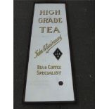 A large John E. Esslemond 'High Grade Tea' advertising mirror, 24 1/2 x 72".