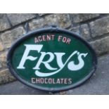 A rare Fry's Chocolates oval lightbox of copper and steel construction with hinged front panel, rear