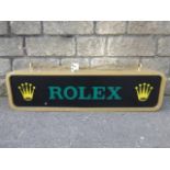 A large Rolex branded hanging double sided lightbox, 37 1/2 x 7 x 9".